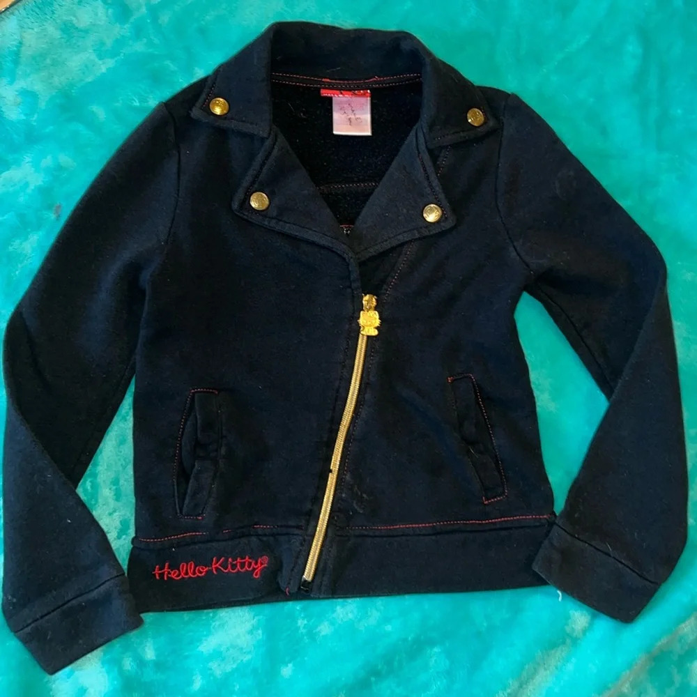 Sanrio Hello Kitty black and red zip up jacket. Sequin hello kitty back. Size 6